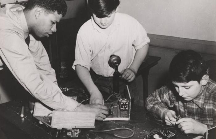 Herbert L. Hardy and boys with electrical equipment, ca. 1951